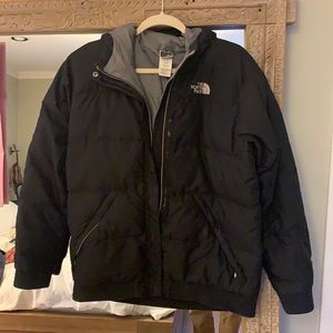 Girls XL North Face coat, black, gray interior.  Insulated with goose down.